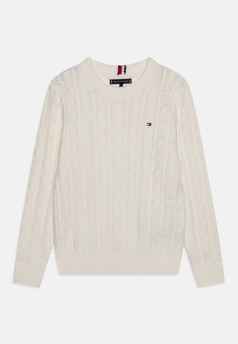 Pull en tricot crème à col rond, avec des poignets et un ourlet côtelés. Présente un petit logo en marine, rouge et blanc sur la poitrine. Texture douce.