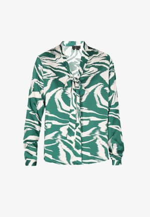 Zeleno-biely vzorovaný blúzku s viazaním na krku, dlhými rukávmi a hladkým, lesklým materiálom s pruhovaným vzorom podobným zebre.