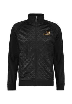 Black jacket with a zippered front, featuring a textured pattern on the upper half and solid sleeves. Logo in gold on the left chest.