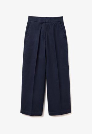 Pantalon bleu marine taille haute à jambes larges avec poches latérales et fermeture frontale dissimulée sur fond blanc.