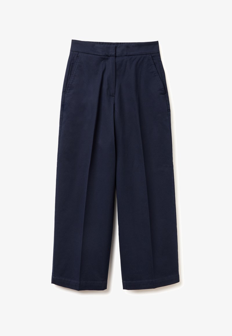 Pantalon bleu marine taille haute à jambes larges avec poches latérales et fermeture frontale dissimulée sur fond blanc.