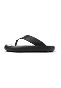 Mustat flip-flop-sandaalit litteällä pohjalla, joissa on teksturoidut hihnat ja pehmustettu sisusta. Logo painettuna sandaalin sisäpuolelle.