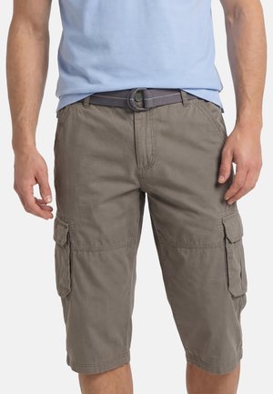 Man wearing gray cargo shorts with side pockets and a black belt, paired with a light blue t-shirt.