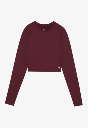Bordeaux langetermijncrop-top met ronde hals, strakke pasvorm en minimale merkaanroep aan de zoom. Gladde textuur en rekbaar materiaal.
