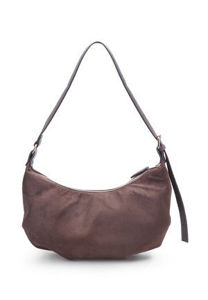 Brown suede shoulder bag with a curved shape, an adjustable leather strap, and a zipper closure. Smooth texture, minimalistic design.