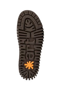 Semelle en caoutchouc avec des motifs profonds, couleur noire, avec un logo d'étoile orange et du texte, conçue pour une adhérence et une durabilité optimales.
