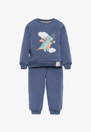 Conjunto de sudadera y pantalones azules para niños con un dragón de dibujos animados escupiendo fuego y el texto "Hola Dragón" en la parte superior.