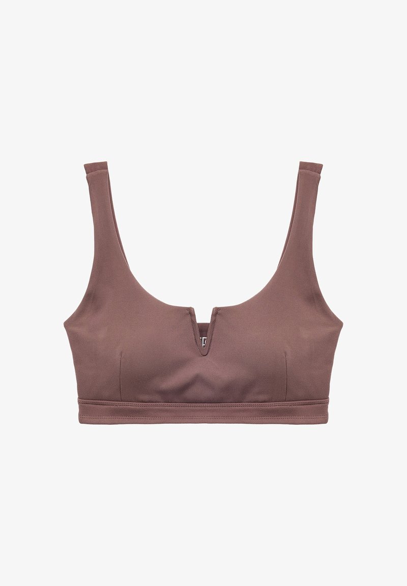 Ruskea kangasbra, jossa on leveät hihnat, sileä pinta ja pieni etuleikkaus keskellä. Ei tukikaaria tai pehmustetta.