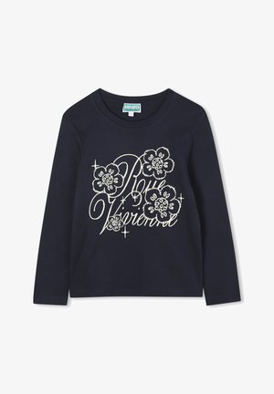 T-shirt à manches longues bleu marine en coton, avec des broderies florales blanches et un design de texte en cursive sur le devant. Encolure ronde.