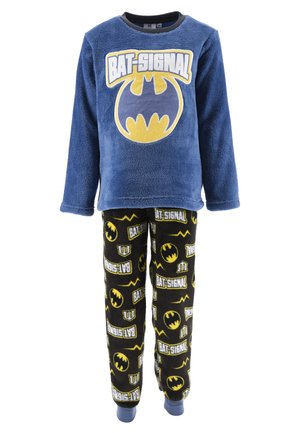 Blaues, fusseliges Langarmoberteil mit "BAT-SIGNAL"-Grafik; schwarze Hose mit gelben und weißen Batman-Logos und -Mustern. Weicher Stoff.