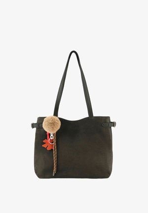 Borsa tote nera con due spallacci, decorata con un pompon beige soffice, un ciondolo a forma di foglia rossa e un nappina in pelle marrone.