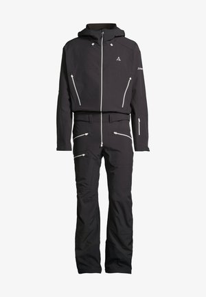 Completo da sci nero con cappuccio con zip, tasche ventilate e zip in argento a contrasto. Realizzato in materiale resistente e impermeabile.