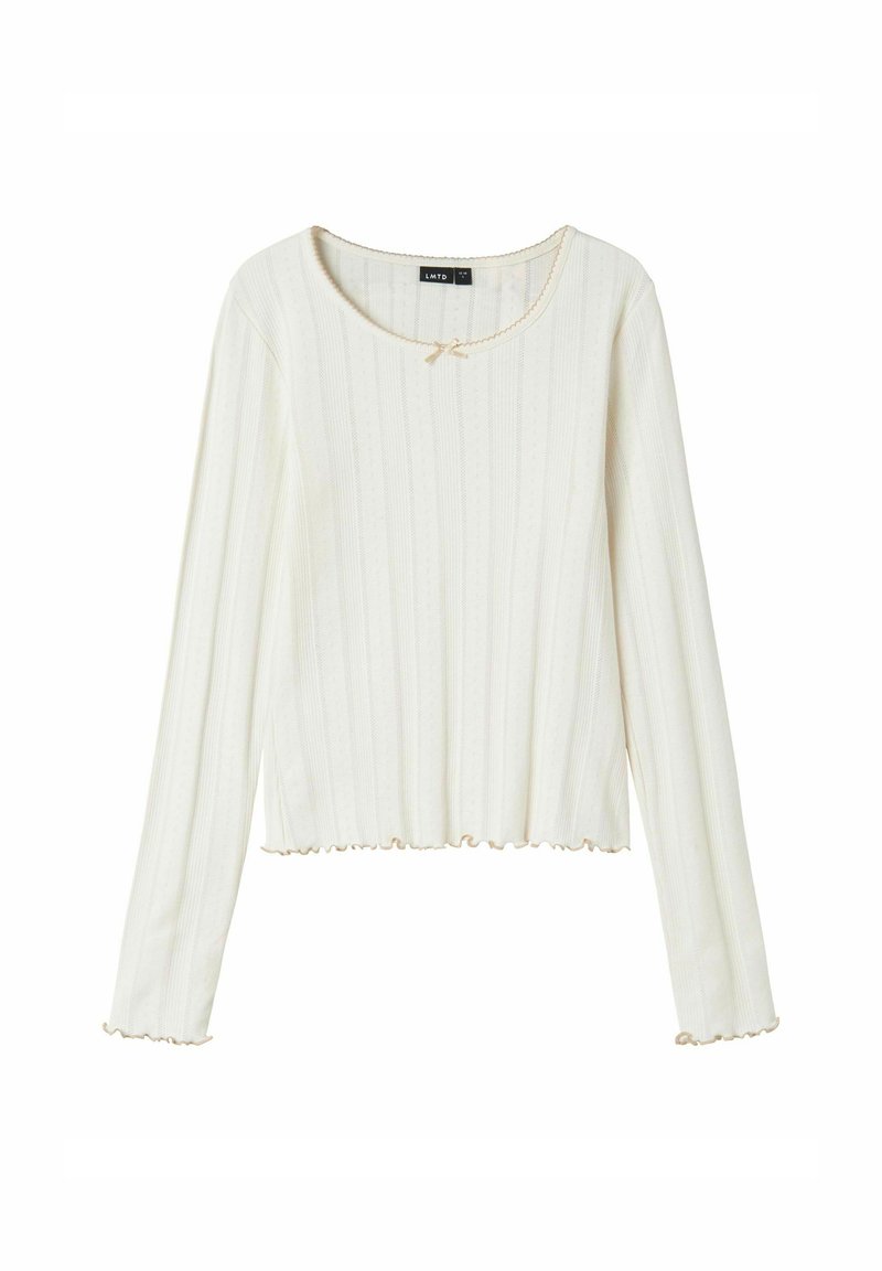 Kremowy longsleeve top z prążkowanego dzianiny z falbaniastymi krawędziami, okrągłym dekoltem i małą ozdobną kokardką na środku kołnierza.
