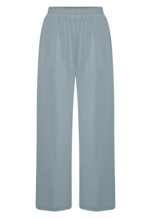 Himmelblaue, weit geschnittene Hose aus weichem Material. Mit einem elastischen Bund und minimalen Nähten für eine entspannte Passform.