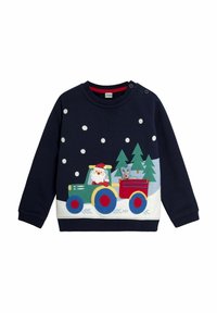 Tumši zila džemperis ar krāsainu traktoru, kurā ir Ziemassvētku vecītis un laulātais, uz priekšpuses izrotāts ar sniegpārsliņām un zaļiem kokiem.