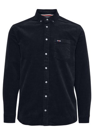 Melnas korduroja krekls ar garām piedurknēm, pogām aizpogājama apkakle, priekšējā kabata un baltas pogas. Kabatā ir krāsaini akcenti.