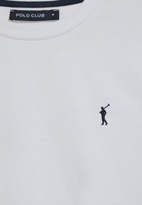 Witte sweatshirt met een ronde hals en ribgebreide manchetten, met een klein marineblauw geborduurd golferlogo op de linkerkant van de borst. Maatlabel: M.