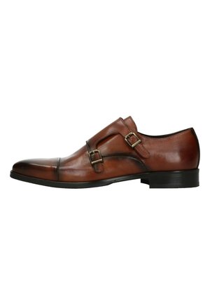 Chaussures en cuir marron avec une finition brillante, dotées de deux boucles ajustables, d'un bout pointu et d'un petit talon noir.
