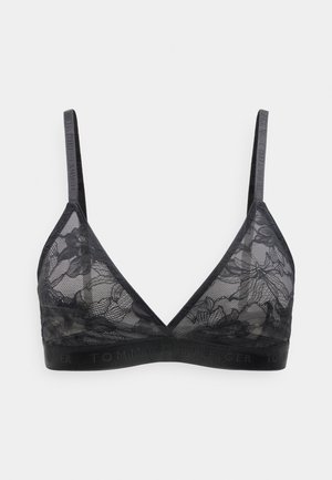 Soutien-gorge bralette en dentelle noire avec motif floral, fines bretelles réglables et bande élastique avec logo Tommy Hilfiger subtil.