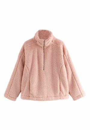 Light pink fleece pullover with a high collar, half-zip front, and loose fit. Features a soft, textured surface and dropped shoulders.
