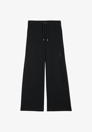 Pantaloni sportivi neri a gamba larga con elastico in vita, coulisse e logo "Juicy Couture" in dettaglio lucido sulla gamba sinistra. Tessuto morbido.