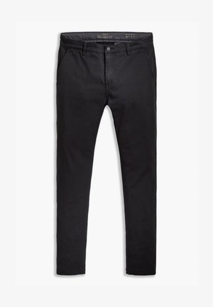 Black cotton chinos with a tapered fit, featuring five pockets, belt loops, and a smooth texture. Zip fly with a button closure.