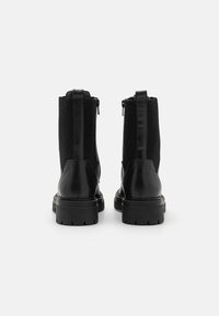 Geox IRIDEA - Stivaletti con plateau - black
