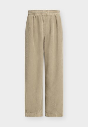 Beige corduroy trousers with an elastic waistband, wide legs, and vertical ribbed texture. Simple design with no visible hardware or accents.