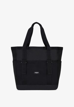 Zwarte tote bag gemaakt van duurzaam stof, met dubbele handvatten, een gladde textuur en een rechthoekige vorm. Logo op de voorkant weergegeven.