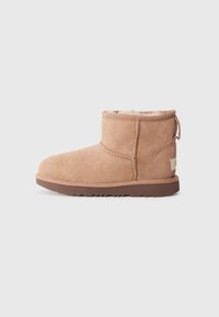Ugg Australia Paraorecchie Ugg Prezzo UGG CLASSIC SHORT II