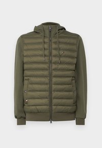 Olivengrøn dunjakke med lynlås foran, hætte og elastiske manchetter. Har syede paneler og sidelommer. Mærkelogo på brystet.