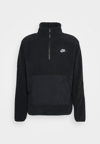 Schwarzer Fleece-Pullover mit hohem Kragen, halbem Reißverschluss und einer vorderen Eingrifftasche. Mit einem weißen Nike-Logo auf der Brust. Weicher Stoff.