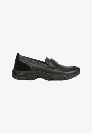 Black leather slip-on loafer with cushioned sole and suede heel accent, designed for casual and formal wear.