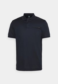 Polo shirt bleu marine en tissu texturé, doté d'un col classique, de manches courtes et d'un détail de logo discret sur la poitrine.