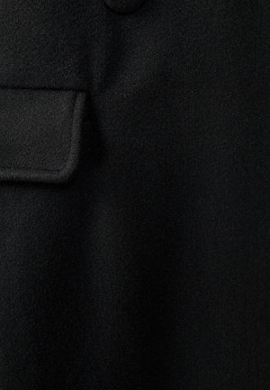 Črn volnen blazer z rahlo teksturirano površino, ki ima žep in okroglo gumico na ovratniku.
