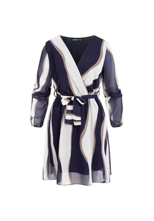 Short navy dress with long sheer sleeves, wrap front, tie belt, and abstract white and beige wavy stripes.