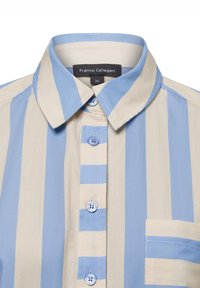 Blue and beige striped shirt with a collar, featuring a front pocket and button closure, crafted from lightweight fabric.