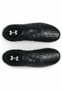 Sorte sporty sko med en teksturert, quiltet mønster. Har en snøring design og logo på sålen. Glatt syntetisk overmateriale.