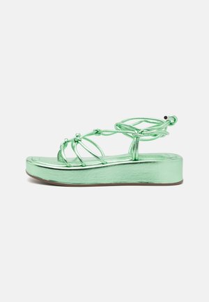 Plateausandaler - metallic green