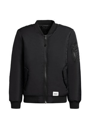 Zwarte bomberjack van gladde stof. Voorzien van een rits aan de voorkant, twee zijzakken en een geassorteerde mouwzak met een logopatch. Ribgebreide manchetten.
