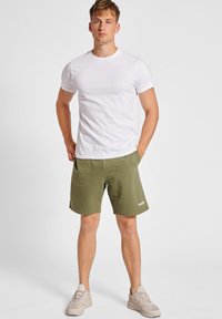 Hummel HMLLGC JEREMY - Korte sportsbukser - four leaf clover
