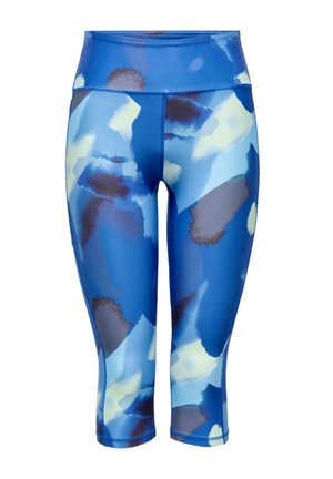 Modré capri legíny s vysokým pásom a abstraktným vzorom škvŕn v odtieňoch svetlomodrej, námorníckej modrej, sivej a svetložltej.