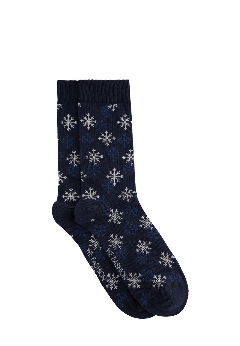 Calcetines azul marino con un patrón de copos de nieve en blanco y azul claro. Cuentan con un ribete acanalado y una textura suave de punto.