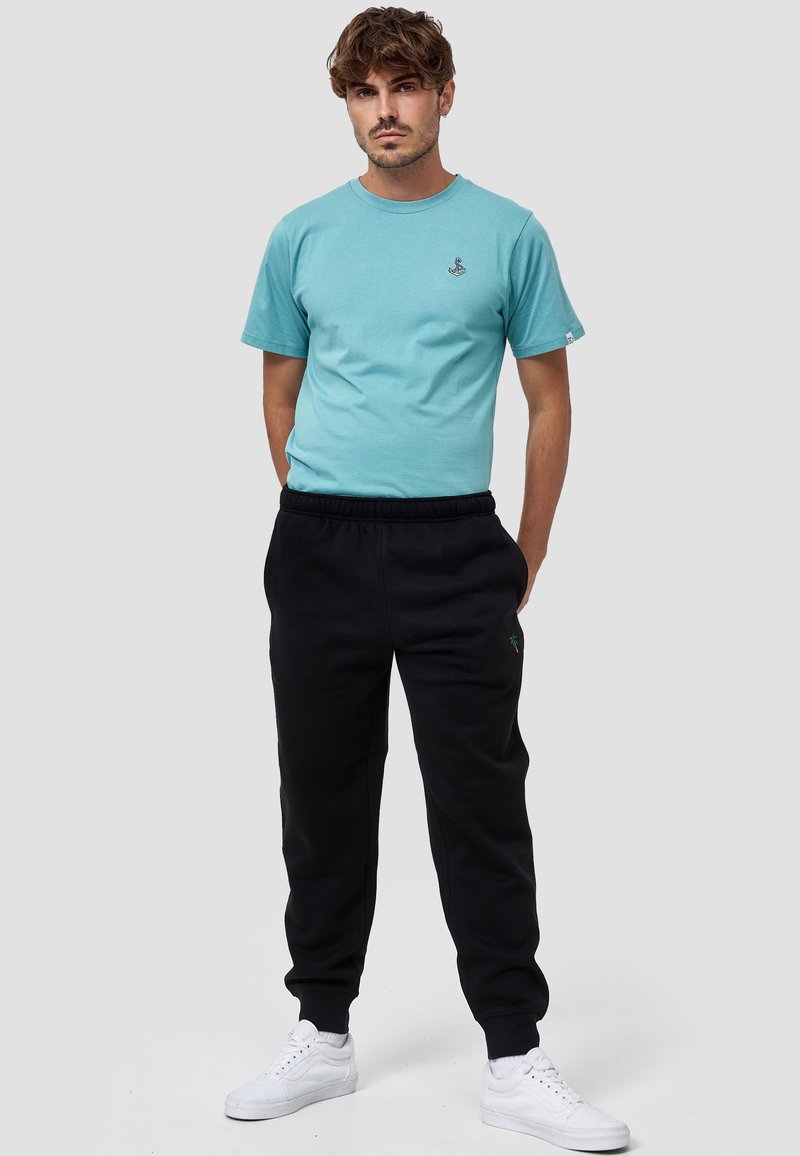 Herren Trainingsanzüge | MIKON PALME Jogginghose schwarz - NE27646 Herren Trainingsanzüge | MIKON PALME Jogginghose schwarz - NE27646