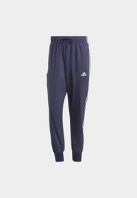 adidas Sportswear ESSENTIALS 3-STRIPES - Tracksuit bottoms - legend ink white