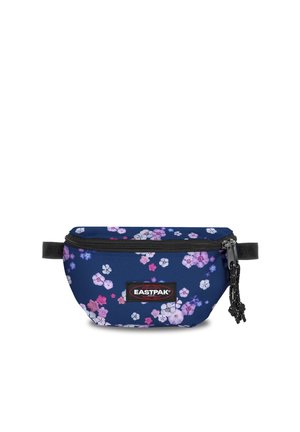 Riñonera Eastpak azul con estampado floral rosa y blanco y cremallera negra con doble tirador.