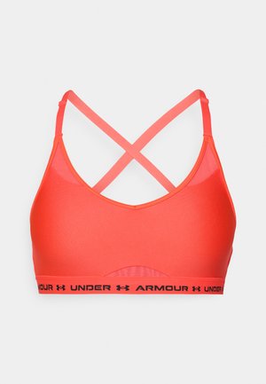 Sustine de sport de culoare corai strălucitor, cu un material neted, detalii din plasă și bretele încrucișate. Bandă neagră cu logo în partea de jos.