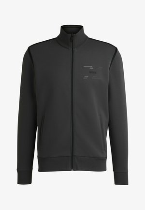 Zwarte ritsjack gemaakt van een gladde stof, voorzien van zijzakken, hoge kraag en een subtiel BOSS-logo op de borst met contrasterende texturen.