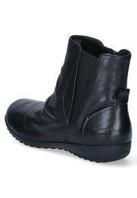 Bottine noire en cuir lisse avec des panneaux latéraux élastiqués, un bout arrondi et une semelle en caoutchouc texturée avec un petit talon.