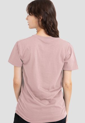 Kurzärmeliges T-Shirt mit Rundhalsausschnitt aus weicher, staubrosafarbener Baumwolle. Verfügt über eine lockere Passform mit minimalen Steppnähten an Schultern und Saum.